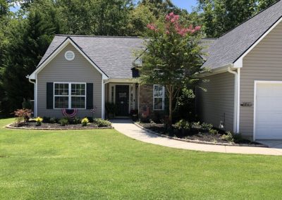 A verdant, meticulously groomed expanse of grass